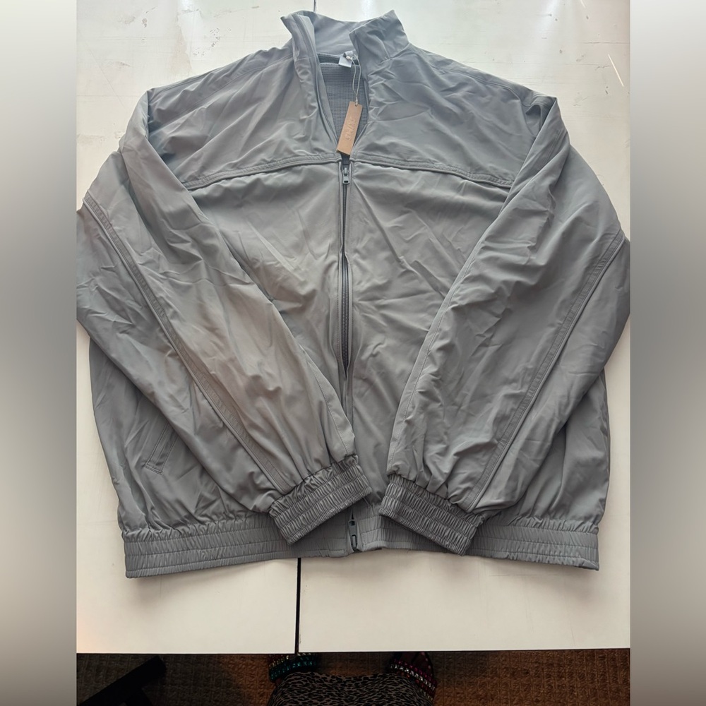 Skims oversized nylon jacket 
Color pacific 
Size XXS
$190 value